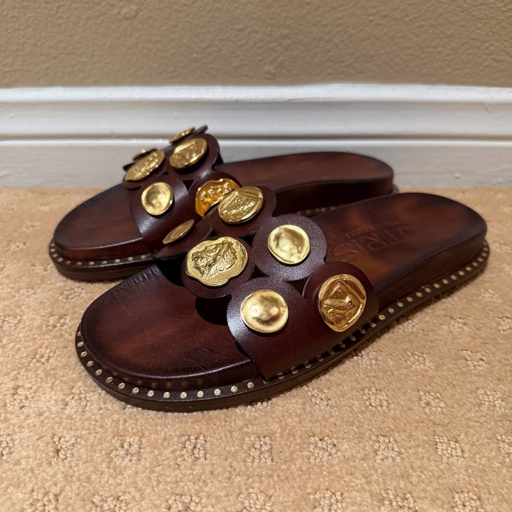 Brand new Kotris Greek leather slide sandals with gold Greek coin details